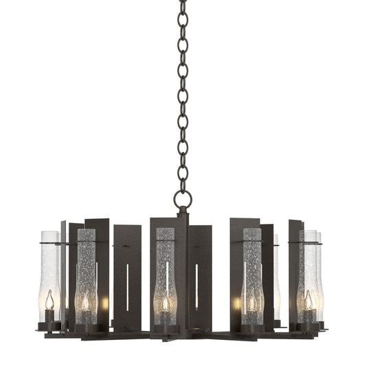 Hubbardton Forge New Town Ten Light Chandelier with metal frame and multiple glass shades hanging in a modern lighting design.