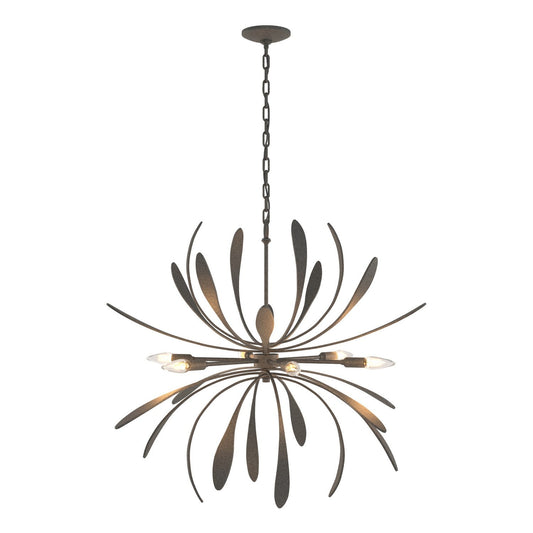 Hubbardton Forge Dahlia six-light chandelier featuring a modern lightingdesign with sleek, elegant metal arms and glass shades.