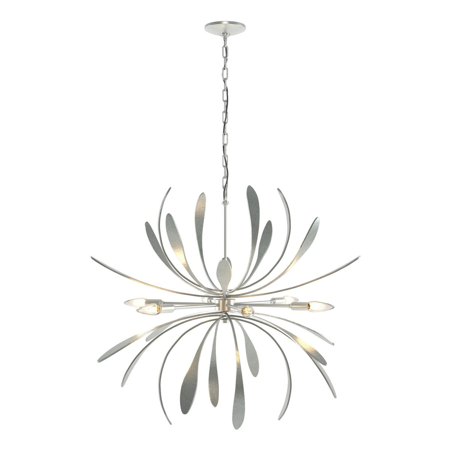 Hubbardton Forge Dahlia six-light chandelier with elegant metal frame and glass shades, hanging from a ceiling in a modern interior