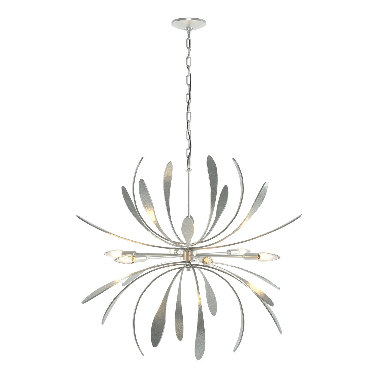 Hubbardton Forge Dahlia six-light chandelier with elegant metal frame and glass shades, hanging from a ceiling in a modern interior