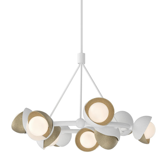 Hubbardton Forge Brooklyn Nine light pendant chandelier with nine glass shades hanging from a metal frame.