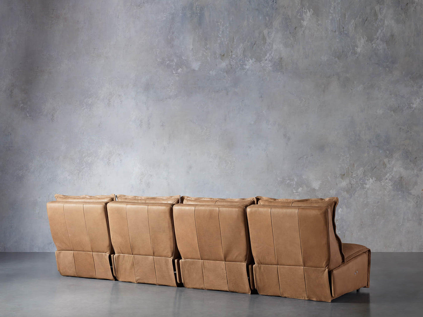 Rowland Leather Four-Piece Armless Motion Modular Sofa