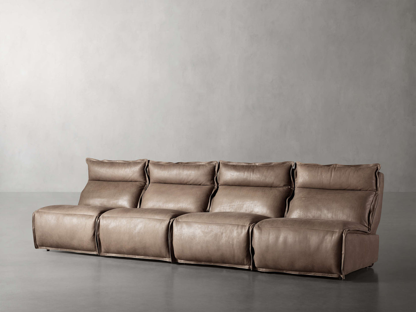 Rowland Leather Four-Piece Armless Motion Modular Sofa