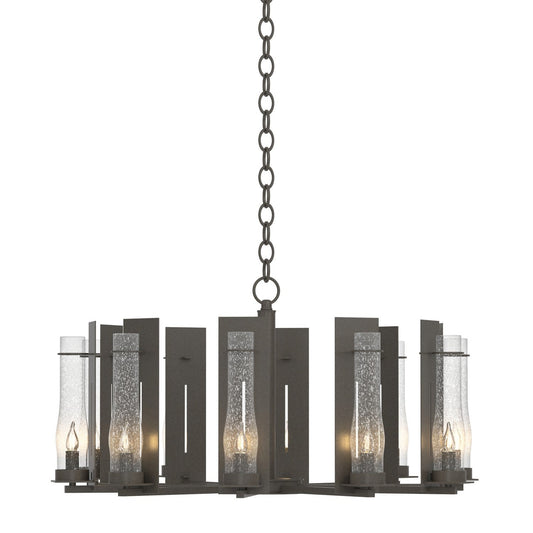 Hubbardton Forge New Town Ten Light Chandelier with modern lighting design and sleek metal finish, hanging from ceiling.