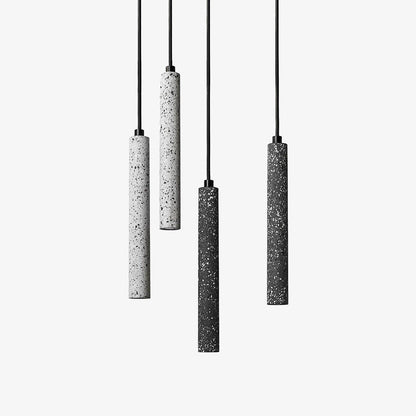 Vakkerlight Bang concrete pendant light hanging with a minimalist design, featuring a smooth concrete finish and a black cord.