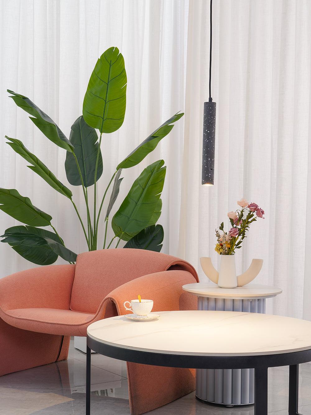 Vakkerlight Bang concrete pendant light hanging from ceiling, modern industrial style with smooth concrete finish.