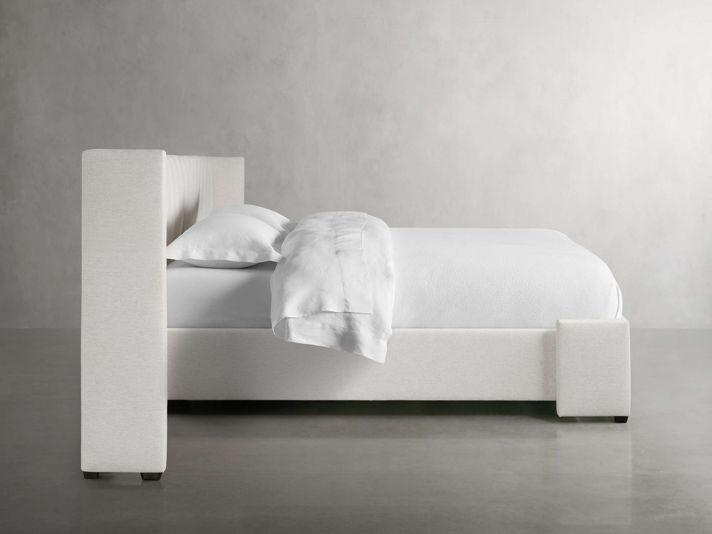 Wyller Channel-Stitched Extended Headboard Bed with Low Footboard